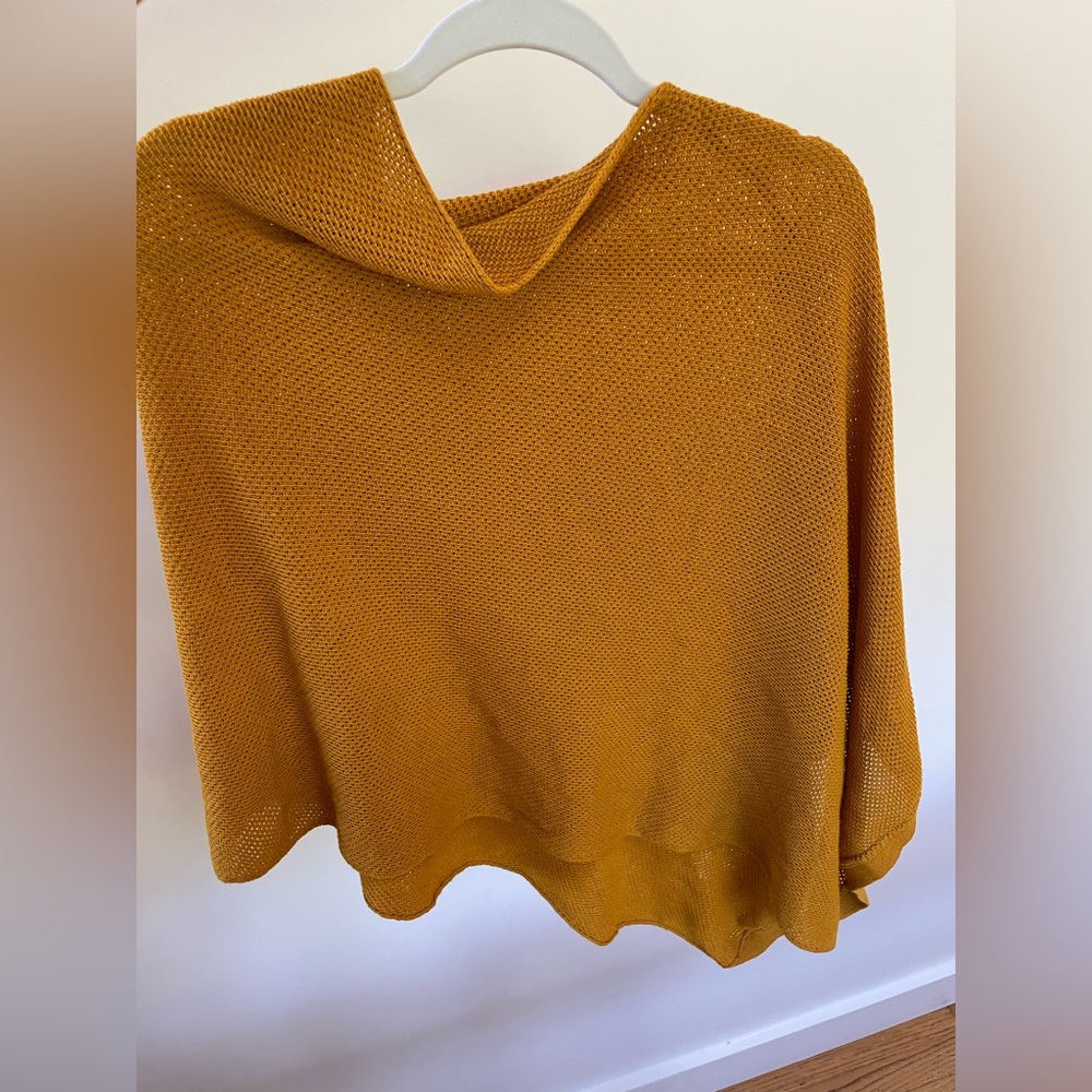 This is a We Are Amma Nursing cover in the color Honey.
